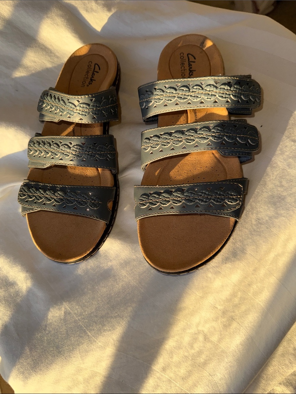 NWOT - Clarks Women's Blue Grey Leather with Triple-Strap Embossed Sandals.